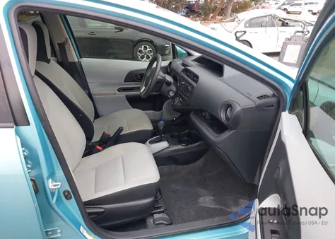 2014 Toyota Prius C One z USA, uszkodzony, nr VIN JTDKDTB30E1070802